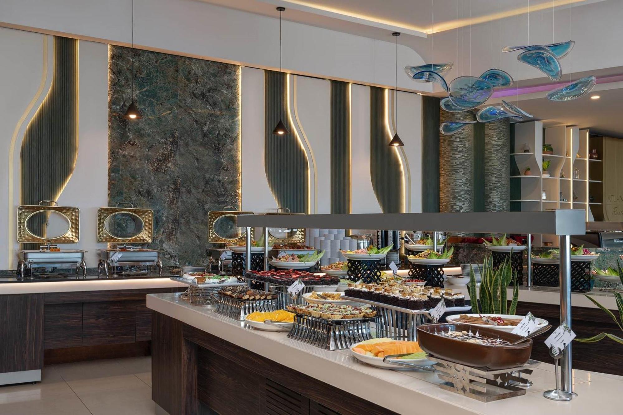 Titanic Hotel & Spa Szulejmánijja Kültér fotó A buffet at a hotel