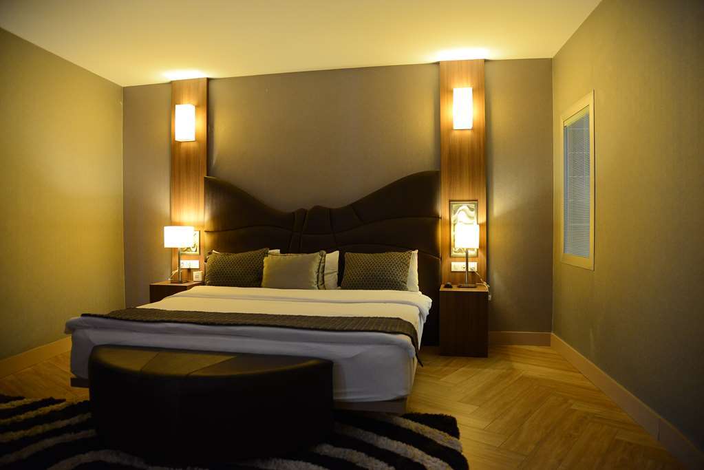 Titanic Hotel & Spa Szulejmánijja Szoba fotó A bedroom