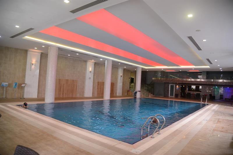 Titanic Hotel & Spa Szulejmánijja Kültér fotó The swimming pool at the hotel